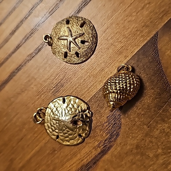 Trio of Goldtone Beach-Themed Pendants - Sand Dollars / Conch Shell - Picture 1 of 5